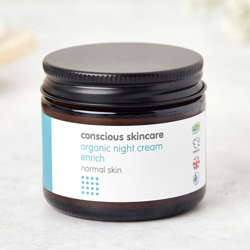 vegan face cream in 60ml amber glass jar with black metal lid