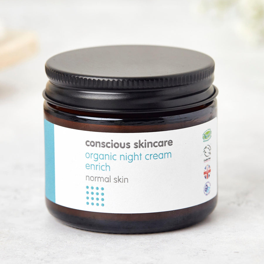 vegan face cream in 60ml amber glass jar with black metal lid