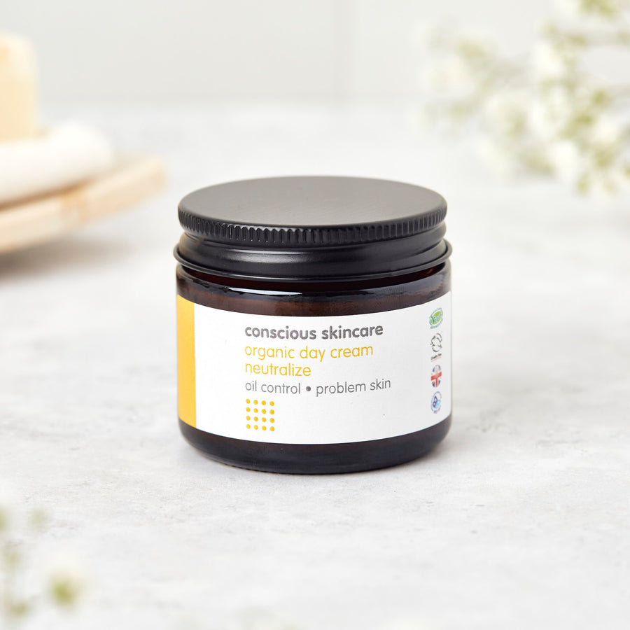 neutralize day organic cream in 60ml amber glass jar with black aluminium lid