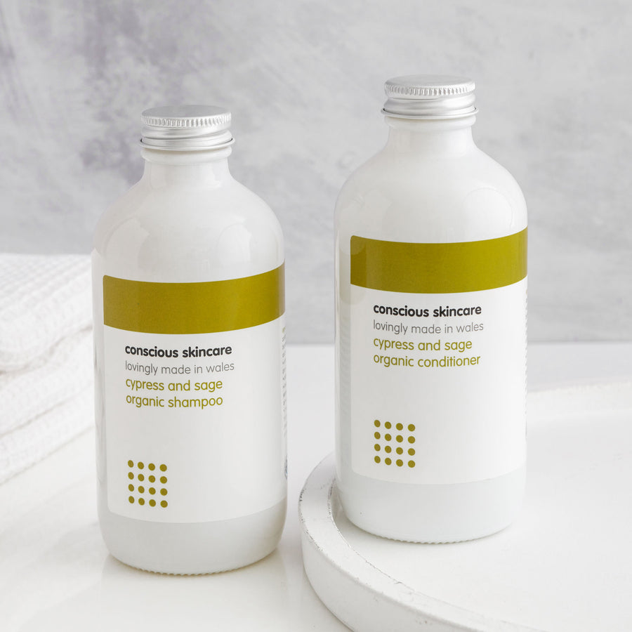 Cypress and Sage Paraben Free Shampoo and Conditioner in white glass bottles
