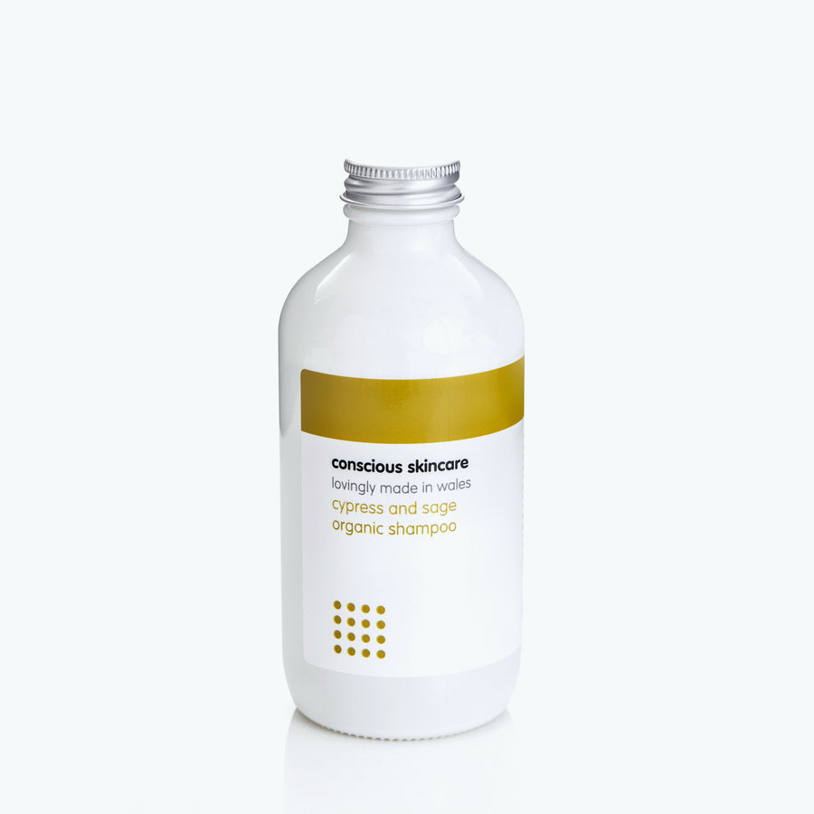 Cypress and Sage Paraben Free Shampoo in a white 235ml glass bottle with silver cap