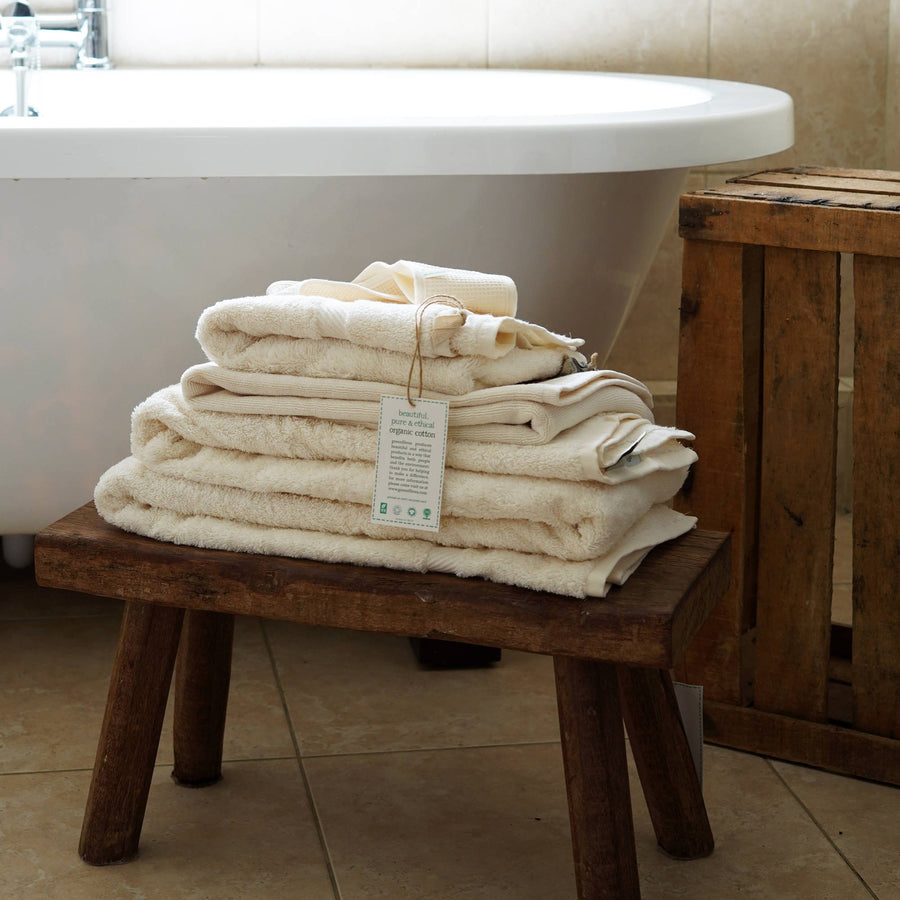 natural towels bale made with organic cotton won wooden stool