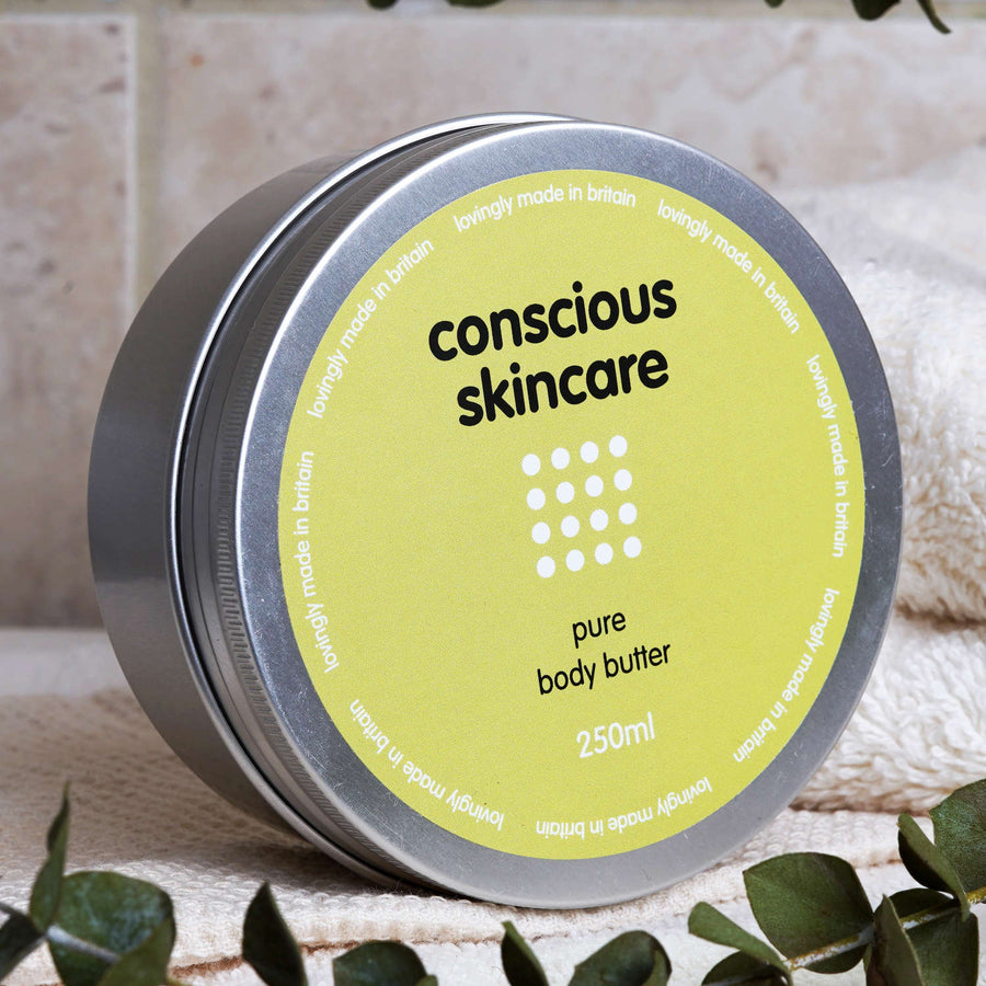Natural body butter in aluminium tin — Pure, fragrance-free (no added fragrance) packshot at an angle