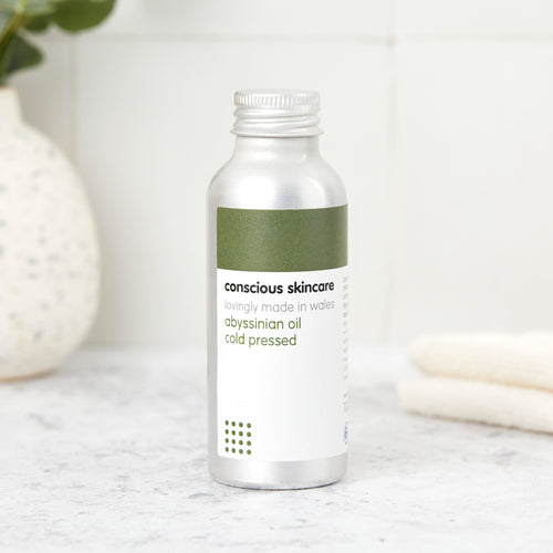 Abyssinian oil bottle — lightweight, cold-pressed oil for hair and skin