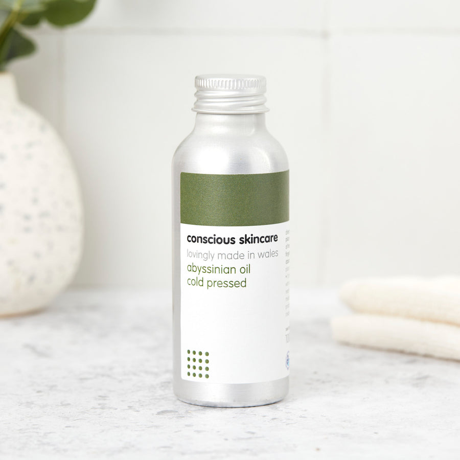 Abyssinian oil bottle — lightweight, cold-pressed oil for hair and skin