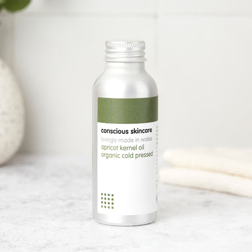 Organic apricot kernel oil bottle — cold-pressed, lightweight face oil for dry or sensitive skin