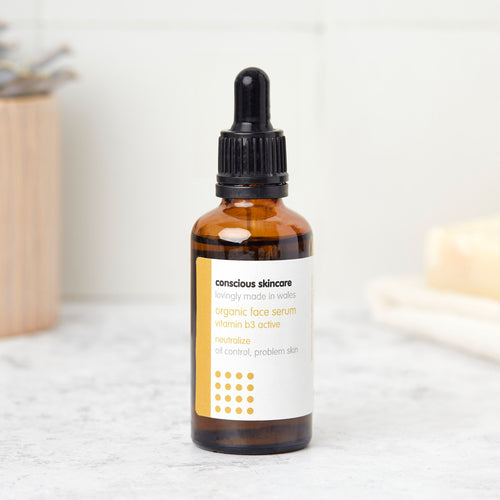 organic face serum for oily & problem skin in amber glass bottle