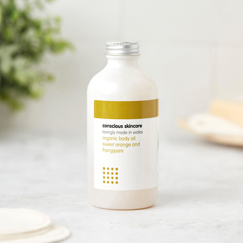 Sweet Orange & Frangipani body massage oil bottle – natural body oil for dry skin