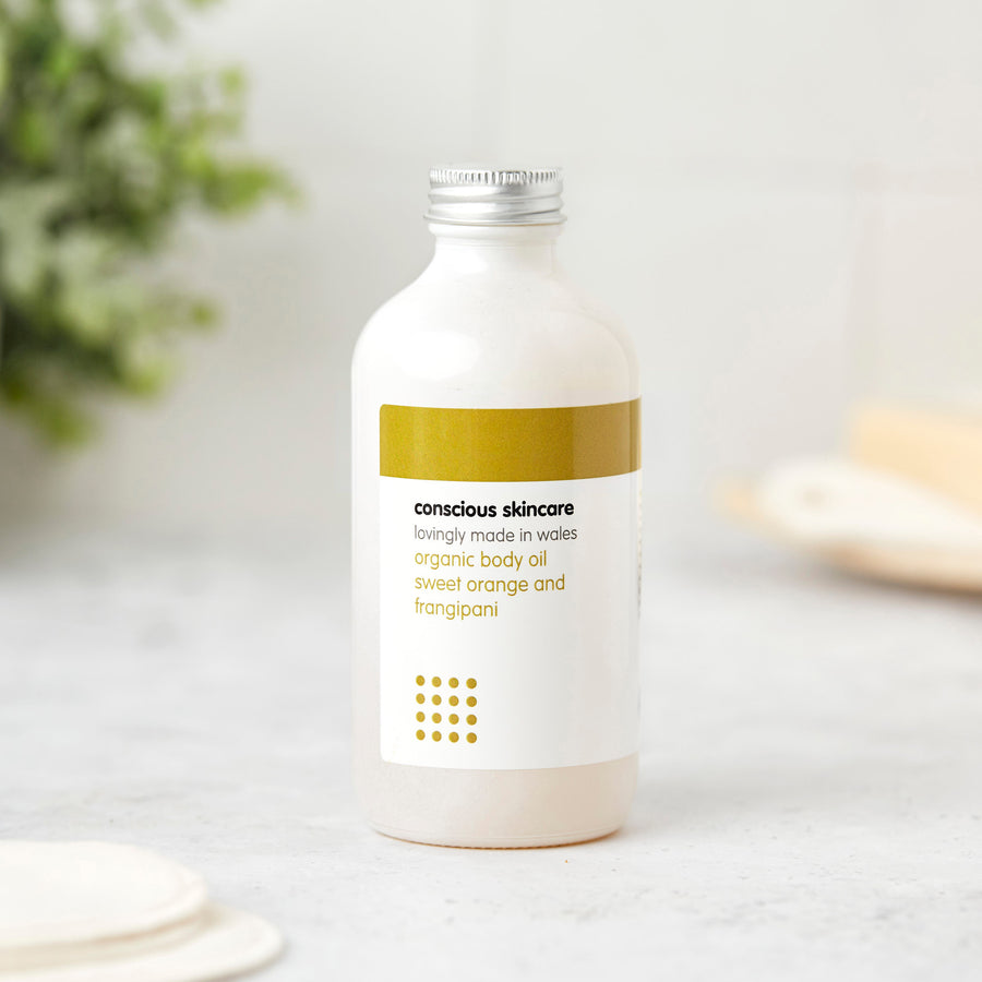 Sweet Orange & Frangipani body massage oil bottle – natural body oil for dry skin